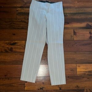 Grey and white striped fitted crop pant. Side zipper, fake back pockets.